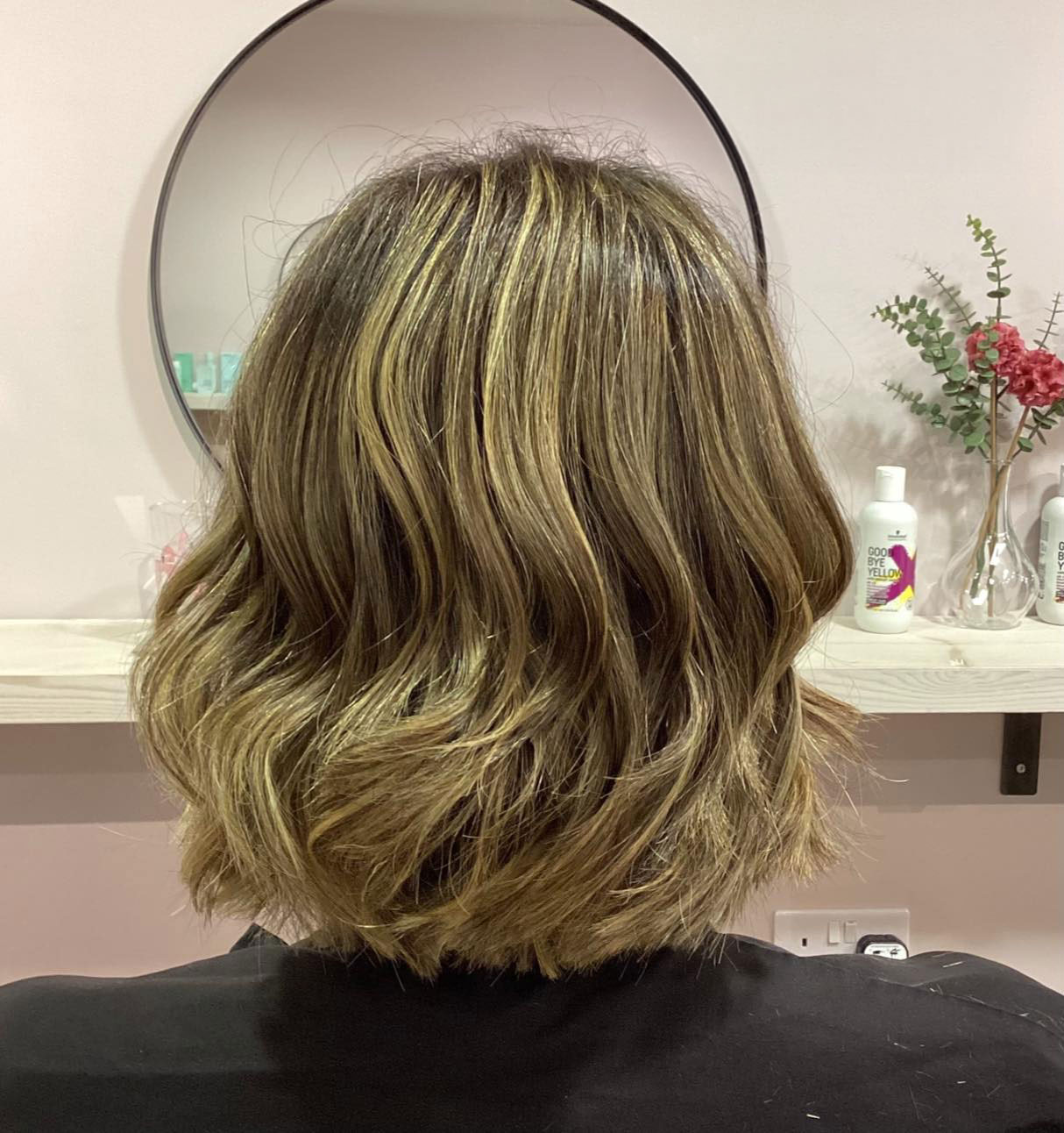 An after image of a clients highlighted hair once cut