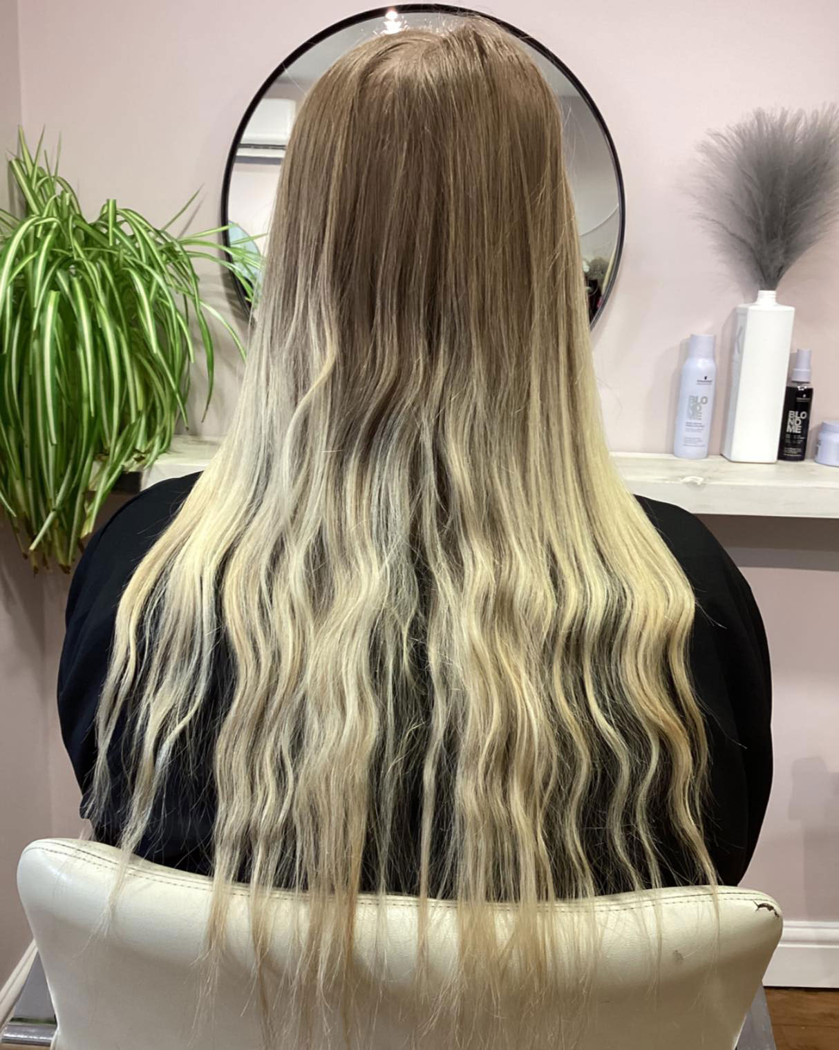 A before image of a clients long blonde hair
